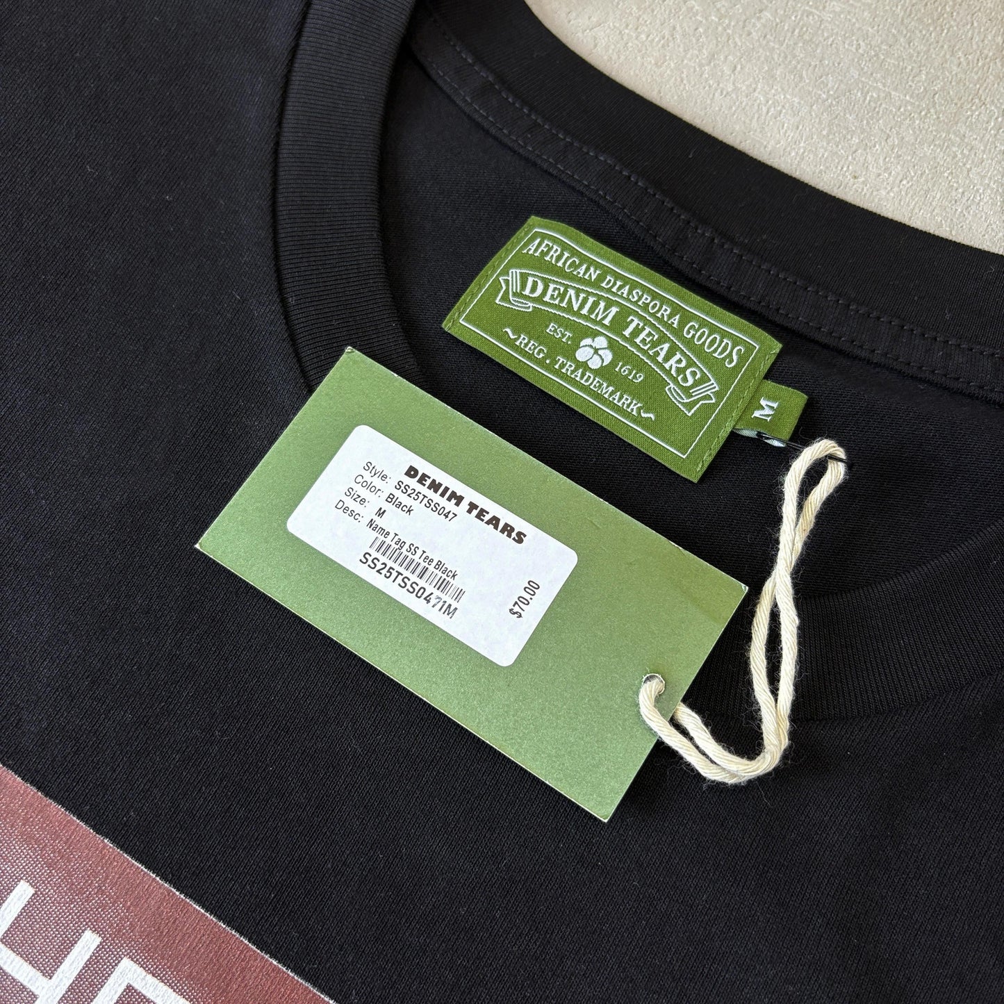 Maglietta con lacrime di denim