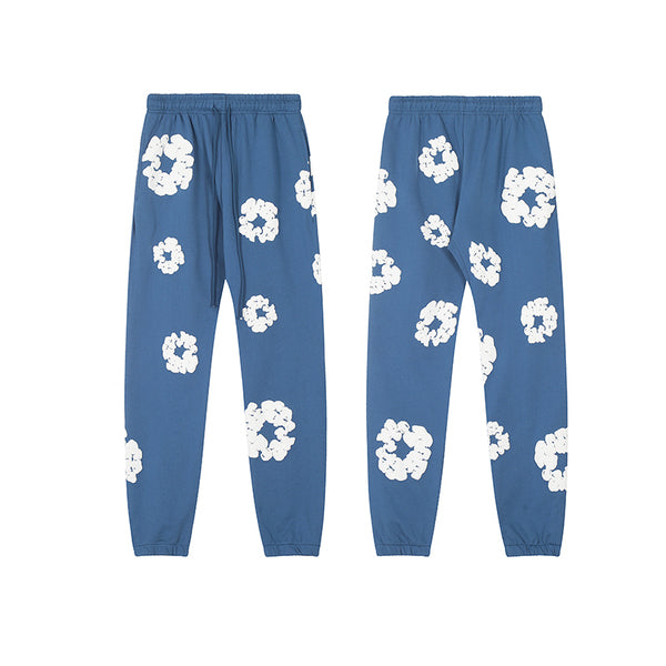 Denim Tears Los pantalones de chándal Cotton Wreath