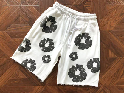 Pantaloncini con strappi in denim 