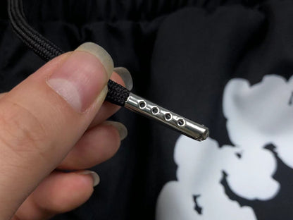 Tuta da bagno con strappi in denim