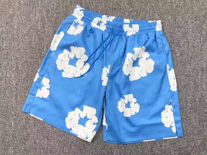 Tuta da bagno con strappi in denim