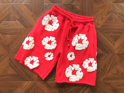 Pantaloncini con strappi in denim 