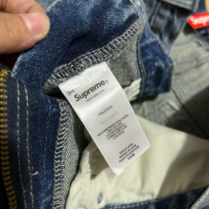 Locker geschnittene Jeans mit Supreme-S-Logo