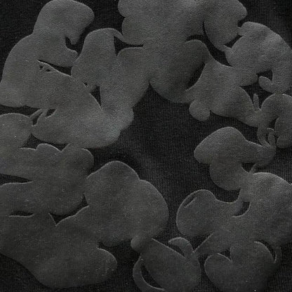 Maglietta con lacrime di denim 