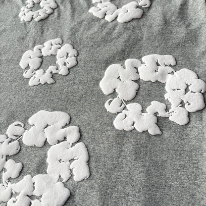 Maglietta con lacrime di denim 