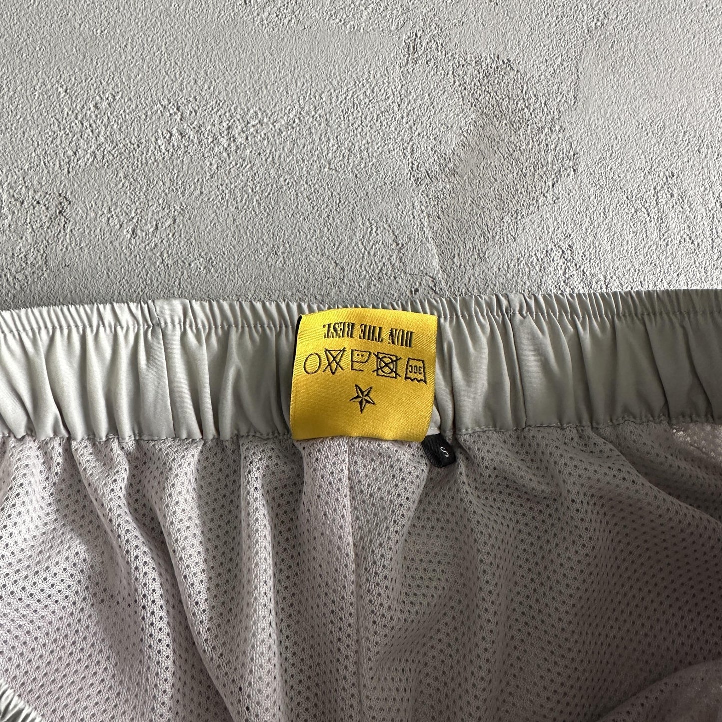 Pantaloncini da corsa e pioggia Corteiz