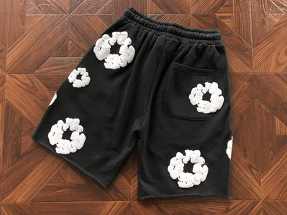 Pantaloncini con strappi in denim 