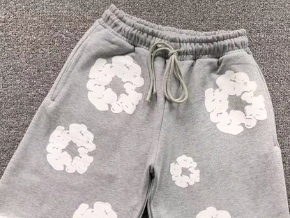 Pantaloncini con strappi in denim