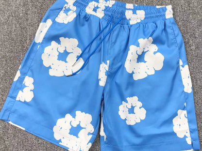 Tuta da bagno con strappi in denim