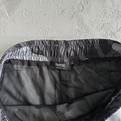 Tuta antivento Trapstar mimetica