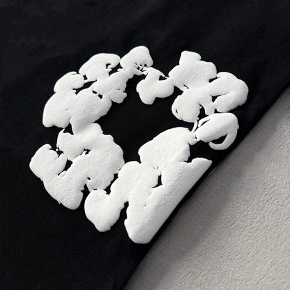 Maglietta con lacrime di denim 