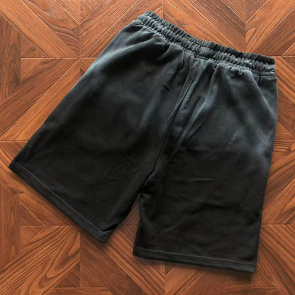 Pantaloncini con strappi in denim 