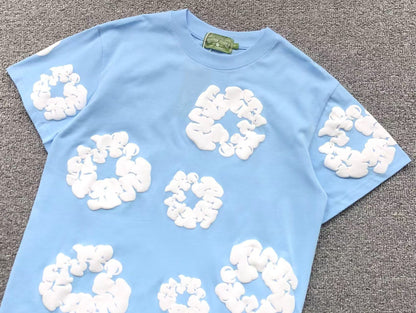 Completo corto con strappi in denim