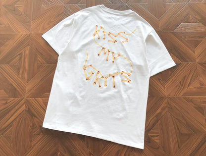 Maglietta con lacrime di denim 