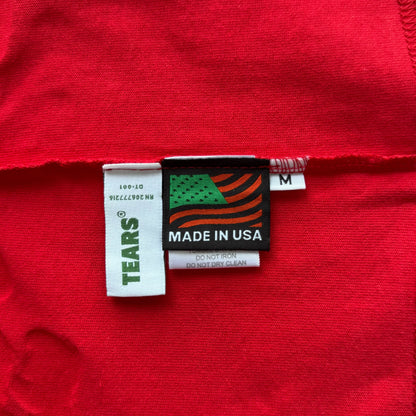 Maglietta con lacrime di denim 