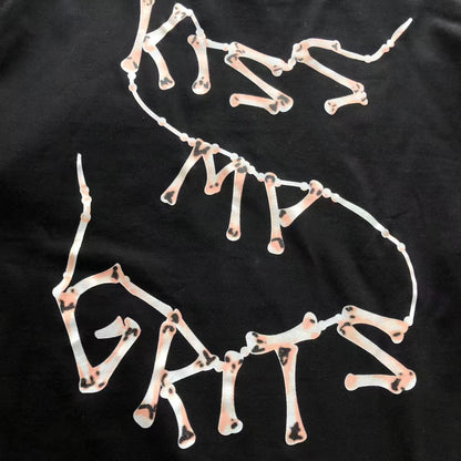 Maglietta con lacrime di denim 