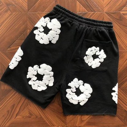 Pantaloncini con strappi in denim 