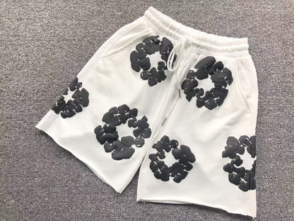 Completo corto con strappi in denim