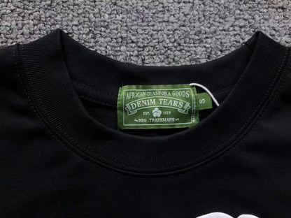 Maglietta con lacrime di denim