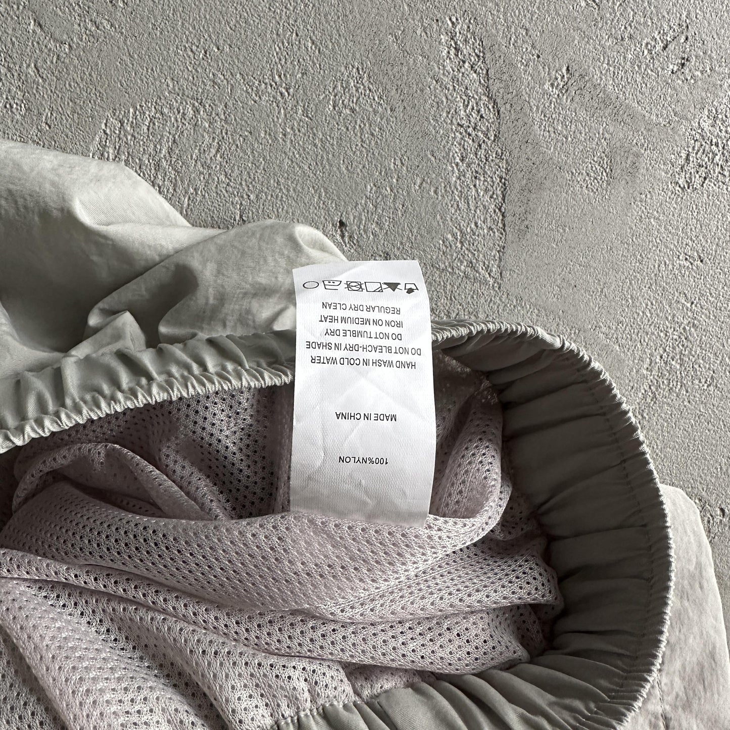 Pantaloncini da corsa e pioggia Corteiz