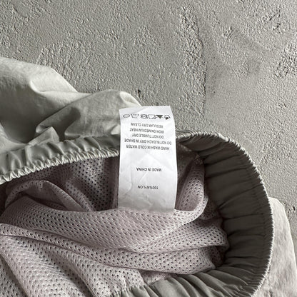 Pantaloncini da corsa e pioggia Corteiz