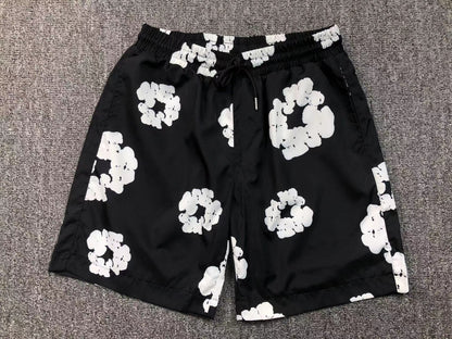 Tuta da bagno con strappi in denim