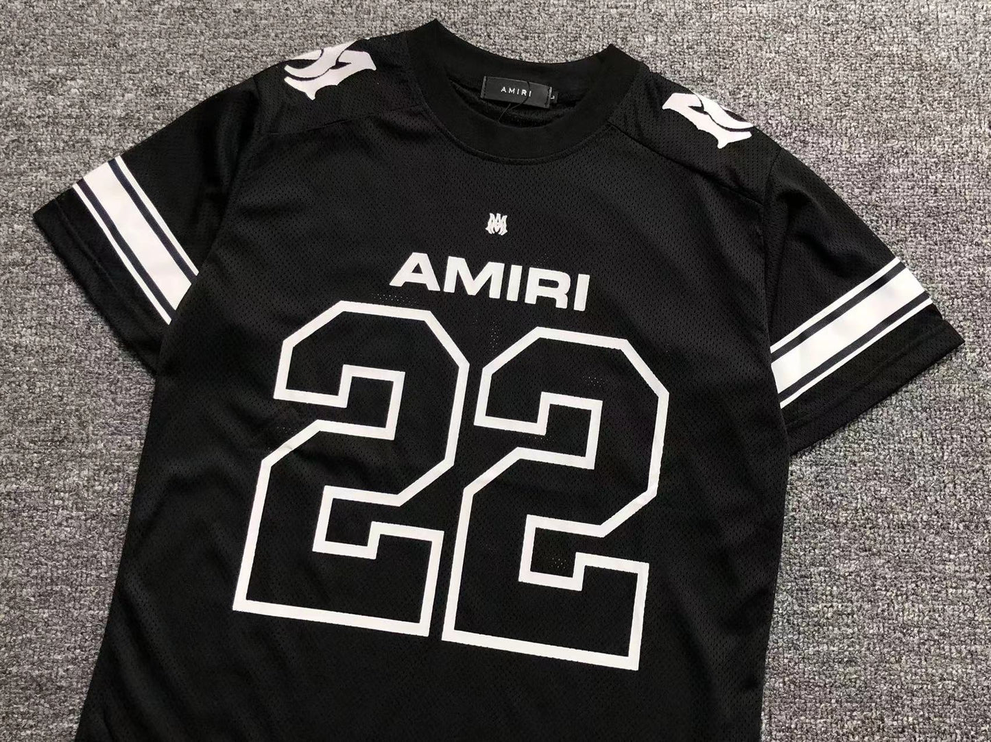 Pantaloncini e maglietta Amiri