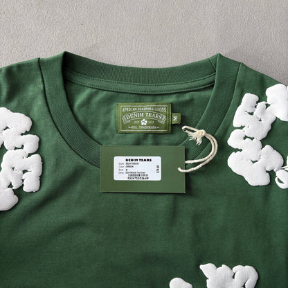 Maglietta con lacrime di denim 