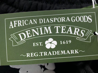 Maglietta con lacrime di denim