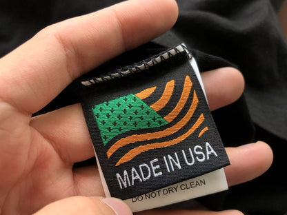 Maglietta con lacrime di denim 