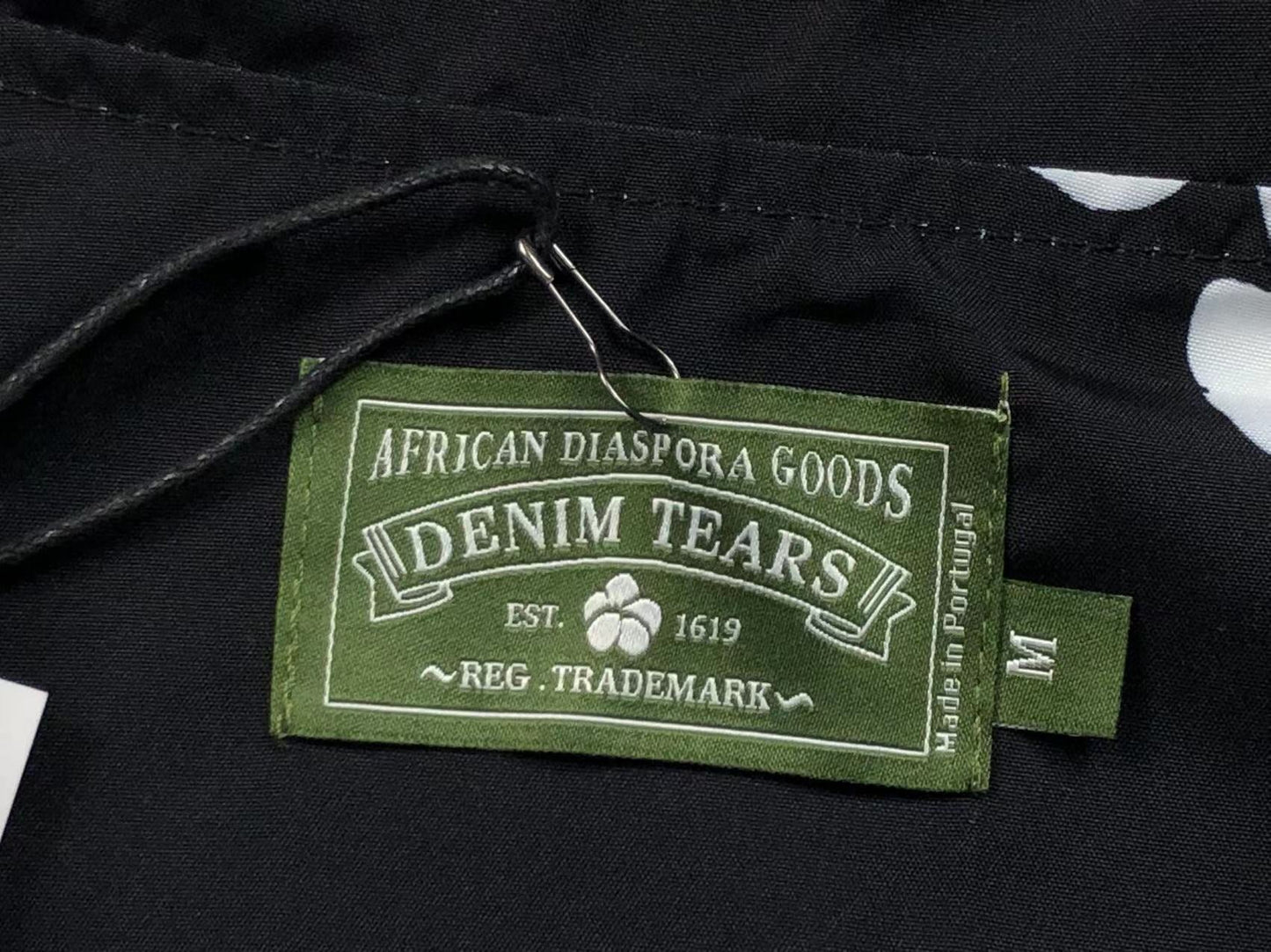 Tuta da bagno con strappi in denim