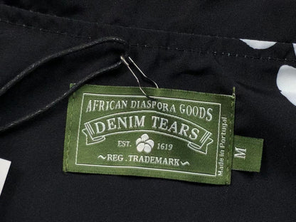 Tuta da bagno con strappi in denim