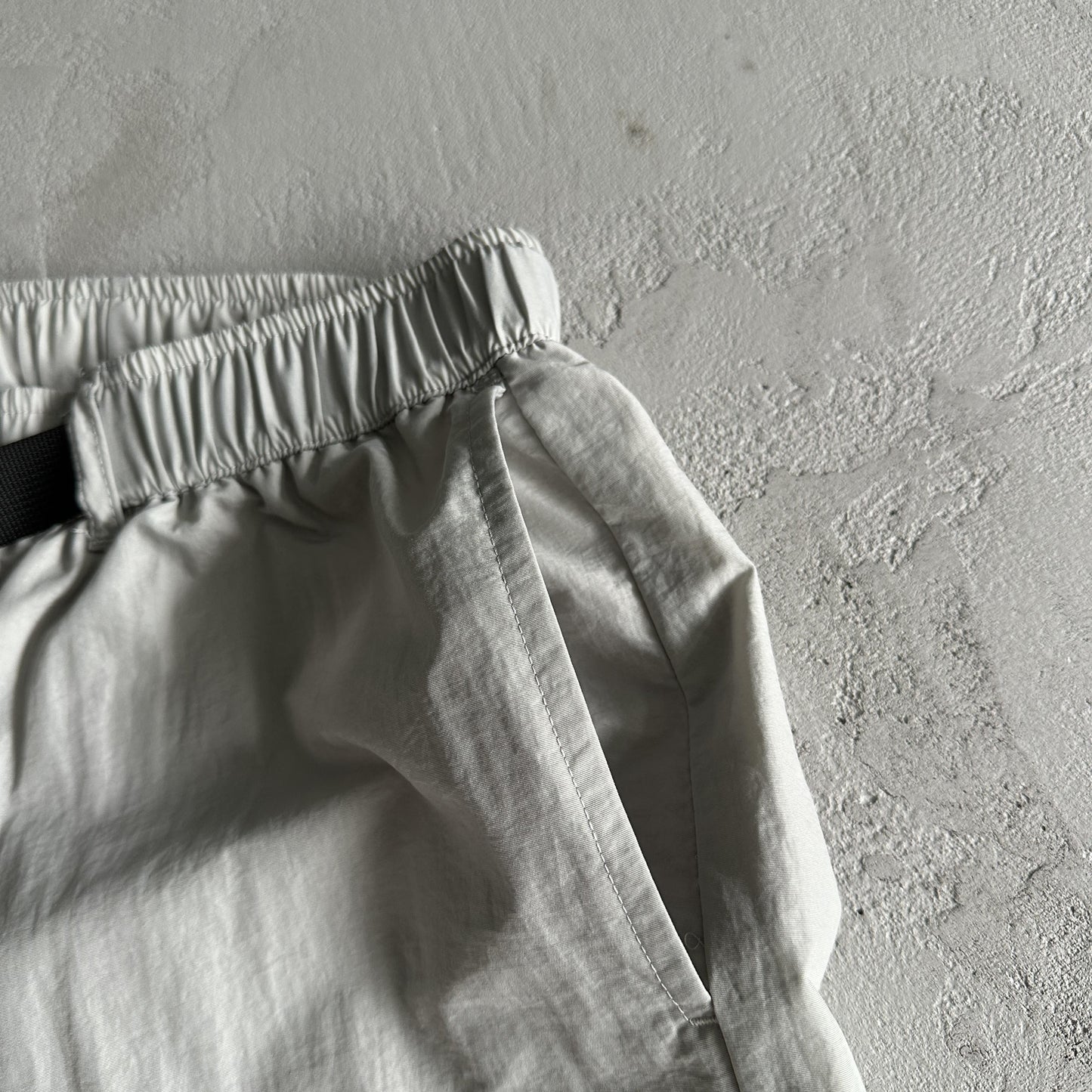 Pantaloncini da corsa e pioggia Corteiz