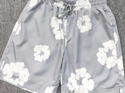 Tuta da bagno con strappi in denim