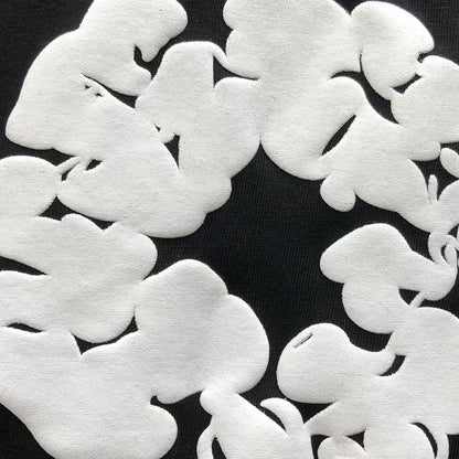 Maglietta con lacrime di denim 