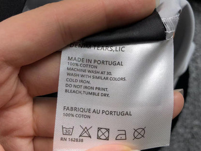 Tuta da bagno con strappi in denim