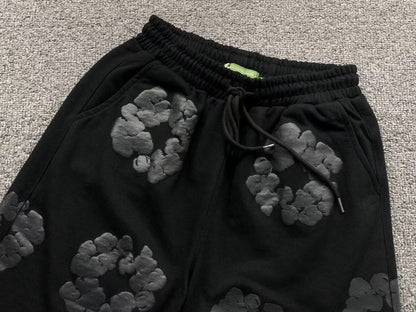 Completo corto con strappi in denim