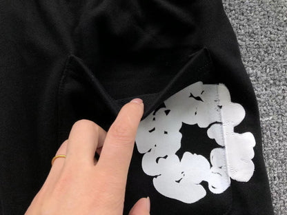 Pantaloncini con strappi in denim