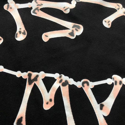 Maglietta con lacrime di denim 