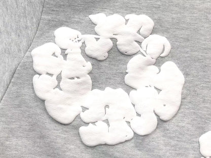 Il denim strappa la ghirlanda di cotone