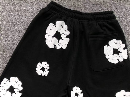 Pantaloncini con strappi in denim