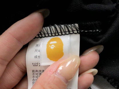 Polo e pantaloncini Bape