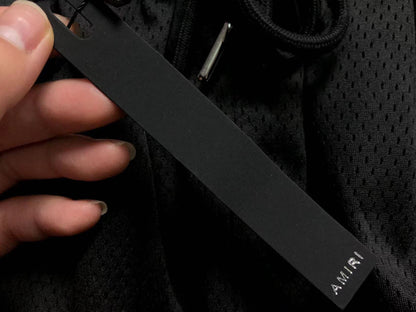 Pantaloncini e maglietta Amiri