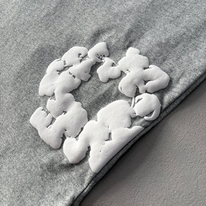 Maglietta con lacrime di denim 