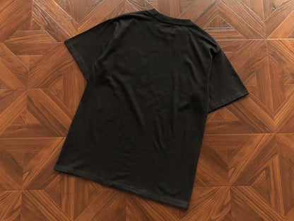 Maglietta con lacrime di denim 