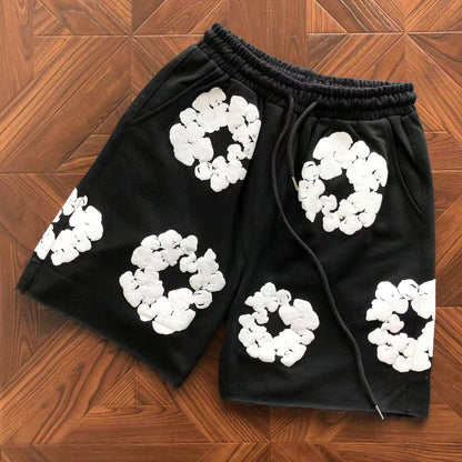 Pantaloncini con strappi in denim 