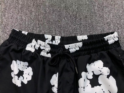 Tuta da bagno con strappi in denim