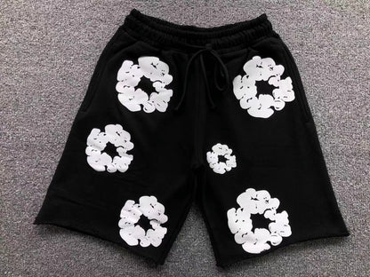 Pantaloncini con strappi in denim