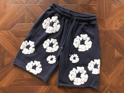 Pantaloncini con strappi in denim 