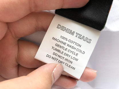 Maglietta con lacrime di denim 